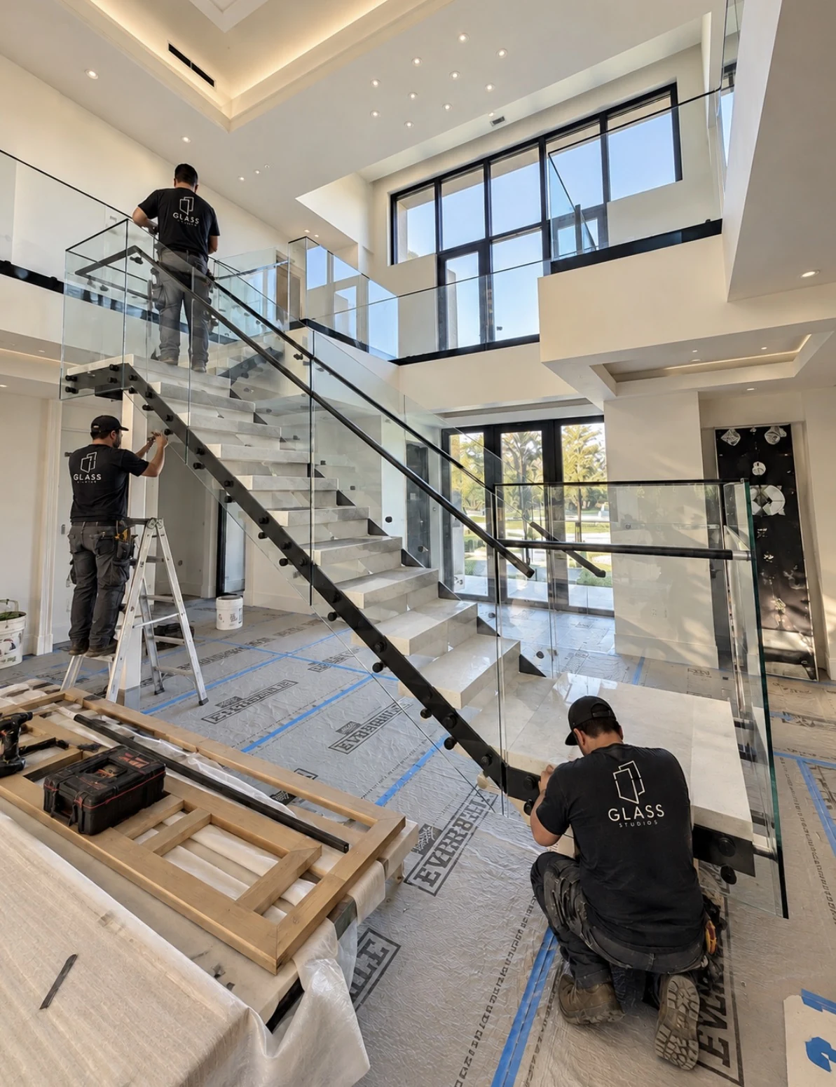 Our crew fitting a stair railing