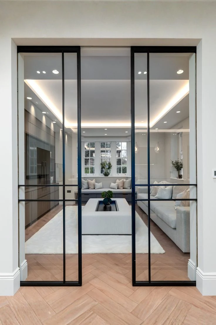 Framed glass doors into a living room