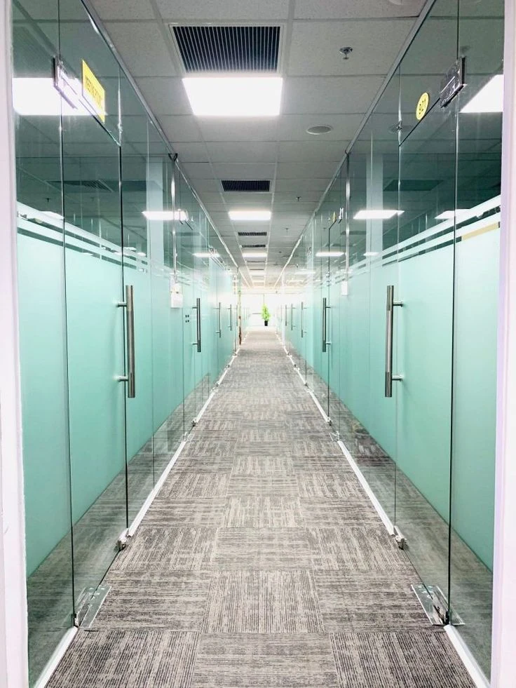 Privacy bands along an office corridor
