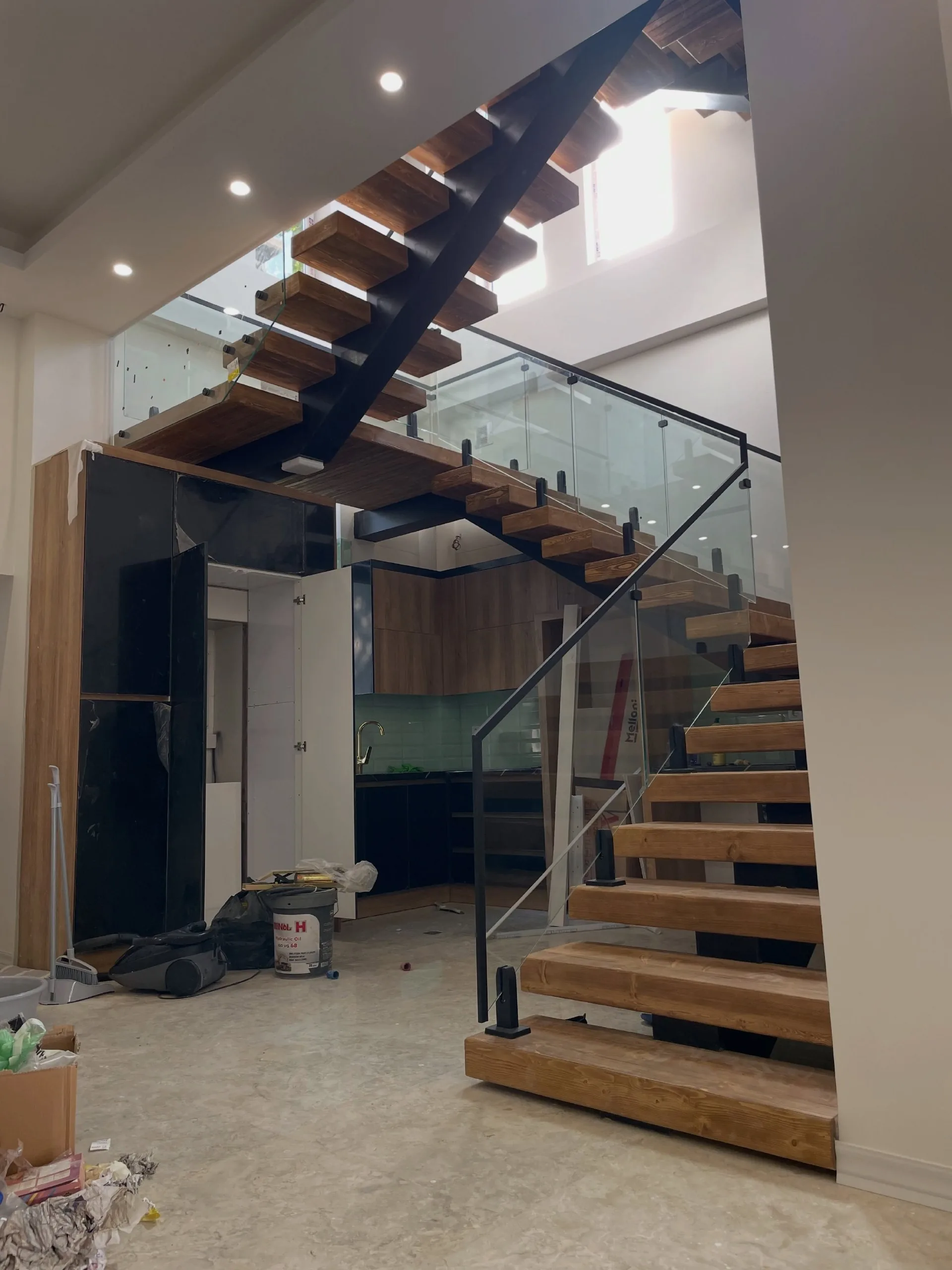 An open stair in a double-height hall